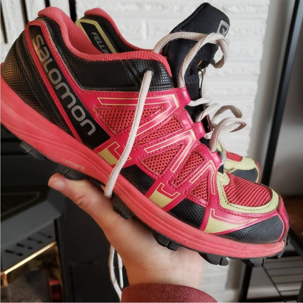 Solomon red trail running shoe
